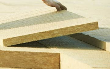 measuring Woodcote Green tapered insulation